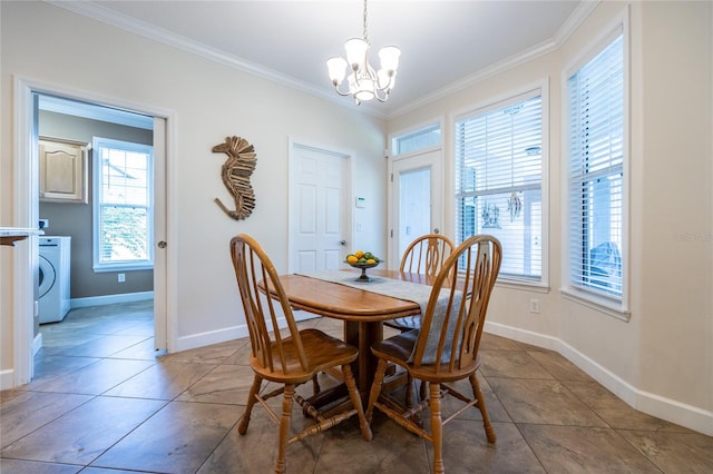 tiled dining area with washer / dryer, an inviting chandelier, and ornamental molding