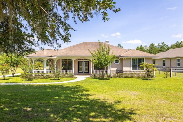 single story home featuring a front yard and a porch