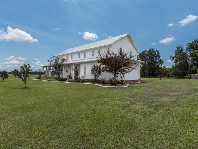 view of home's exterior featuring a yard