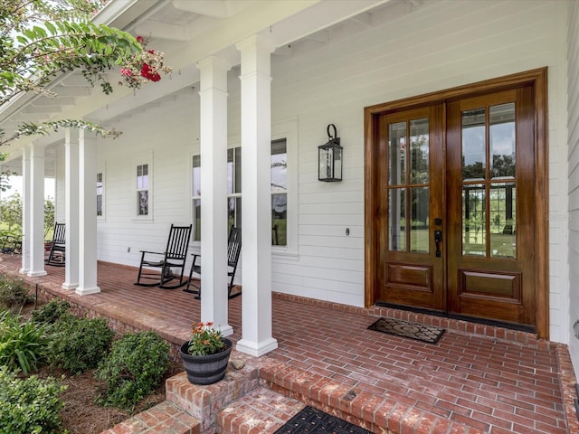 doorway to property featuring a porch