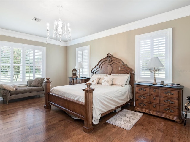 bedroom featuring crown molding, dark hardwood / wood-style floors, an inviting chandelier, and multiple windows