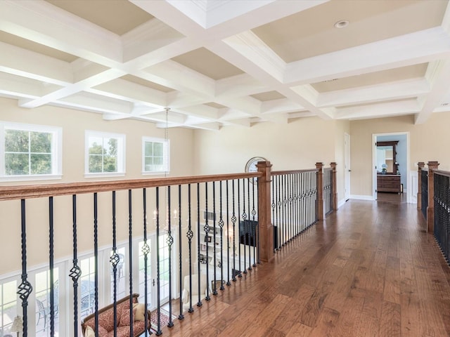 hallway featuring coffered ceiling, beam ceiling, and dark hardwood / wood-style flooring