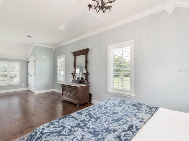 bedroom featuring dark hardwood / wood-style floors, ornamental molding, a notable chandelier, and vaulted ceiling