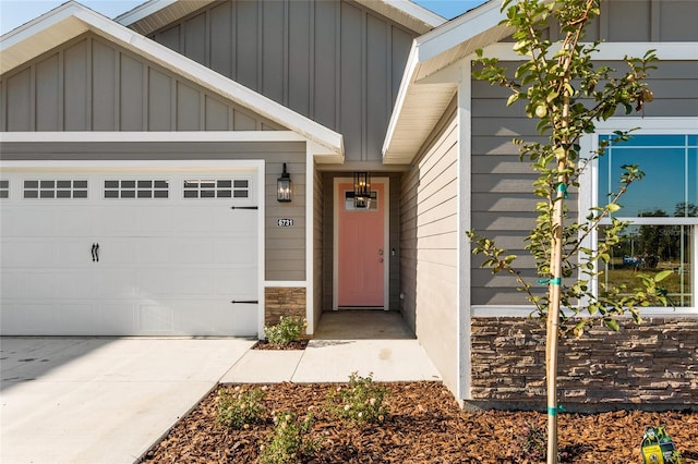 property entrance with a garage