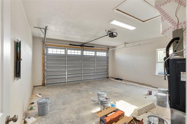 garage with heating unit and a garage door opener