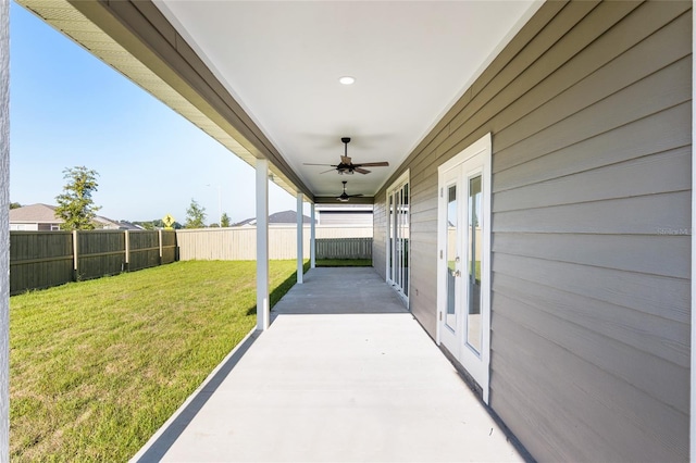 view of patio with french doors and ceiling fan