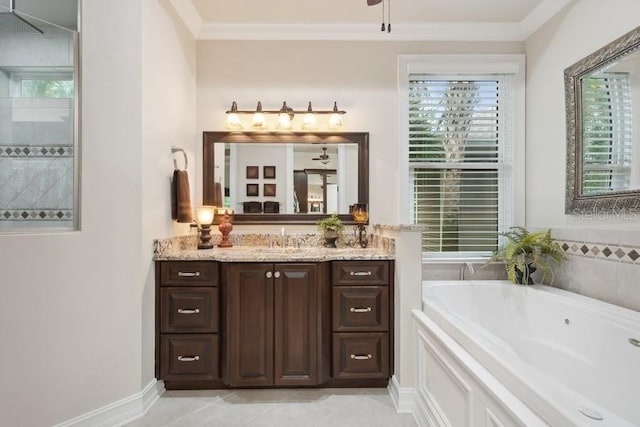 bathroom featuring tile patterned floors, a tub, vanity, ceiling fan, and crown molding