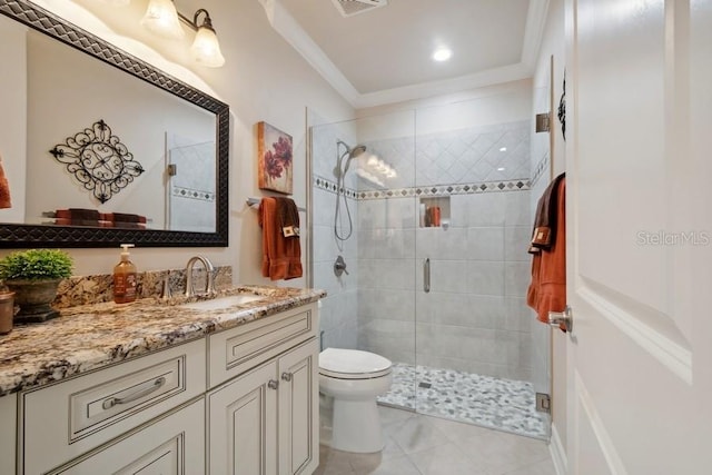 bathroom with a shower with shower door, vanity, toilet, and ornamental molding