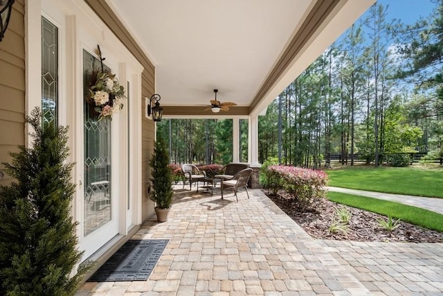 view of patio with ceiling fan