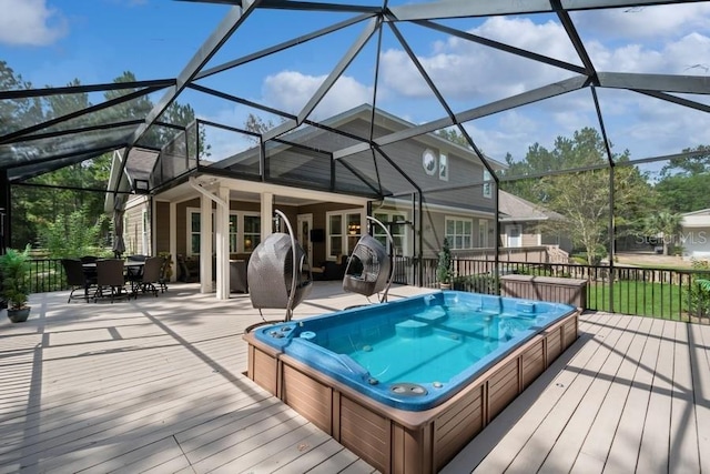 wooden deck featuring a lanai