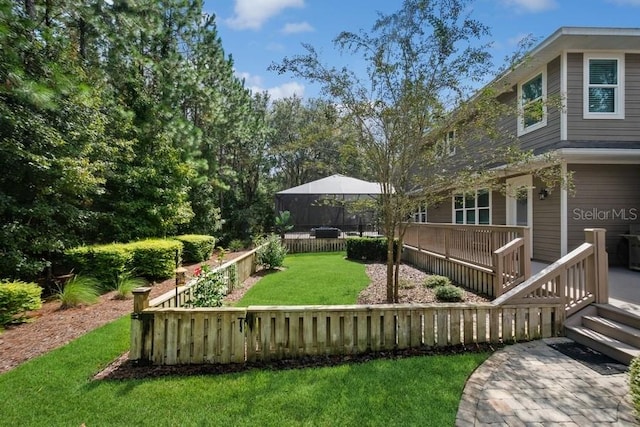 view of yard featuring a deck