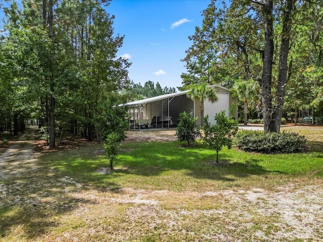 view of yard featuring a carport