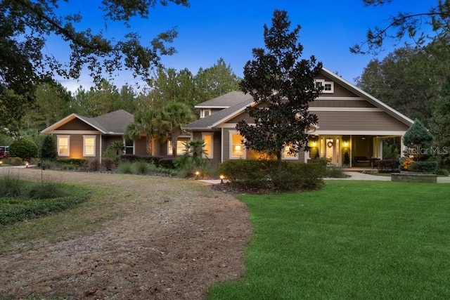 view of front of home featuring a yard