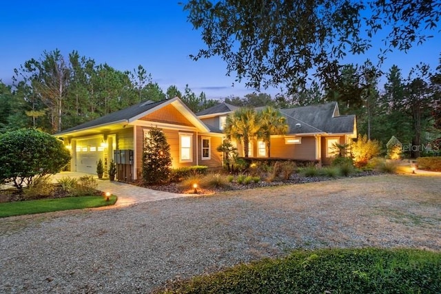 ranch-style home with a garage