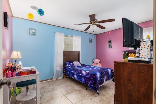 bedroom with ceiling fan and light tile patterned floors