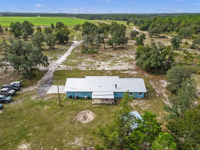 birds eye view of property featuring a rural view