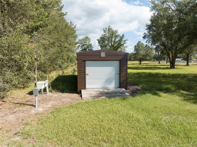 garage with a lawn