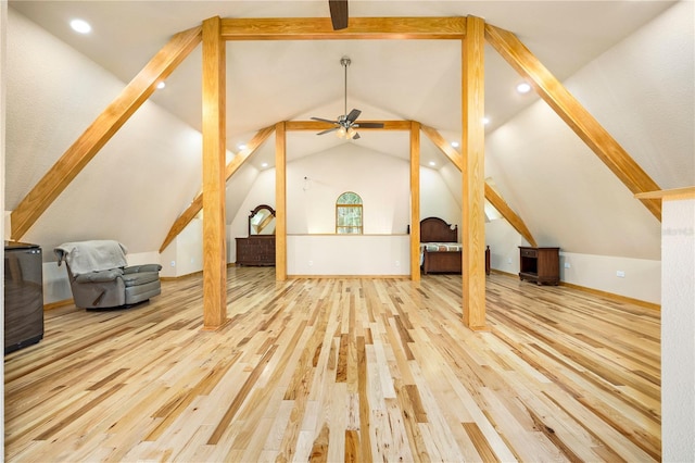 bonus room featuring lofted ceiling, light hardwood / wood-style floors, and ceiling fan