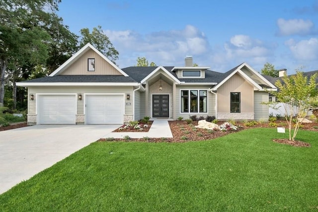 craftsman inspired home featuring a front yard, a garage, and french doors