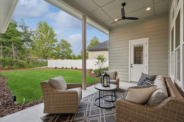 view of patio featuring ceiling fan