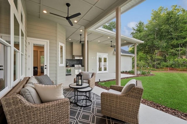 view of patio / terrace with an outdoor kitchen, french doors, ceiling fan, and area for grilling