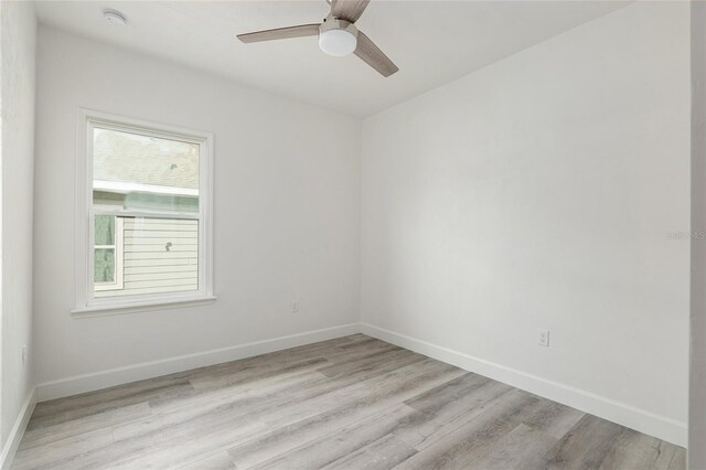 unfurnished room with light hardwood / wood-style floors and ceiling fan