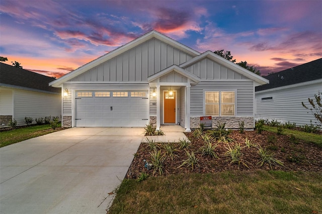 craftsman house with a garage