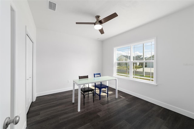 home office featuring ceiling fan and dark hardwood / wood-style flooring