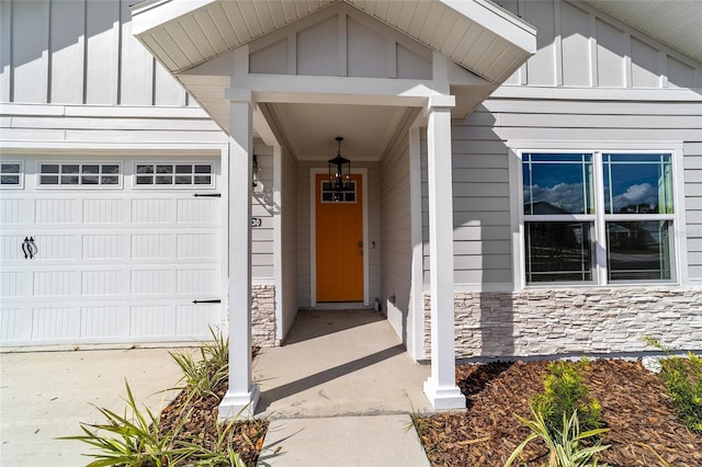 doorway to property featuring a garage