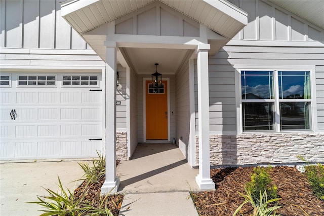 entrance to property featuring a garage