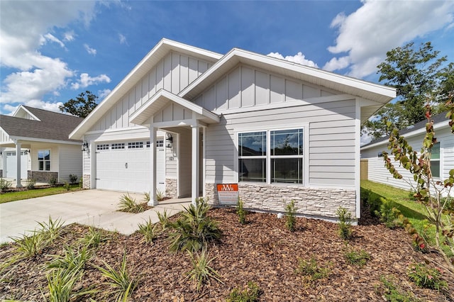 craftsman inspired home featuring a garage