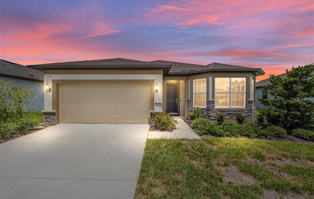 prairie-style house featuring a garage