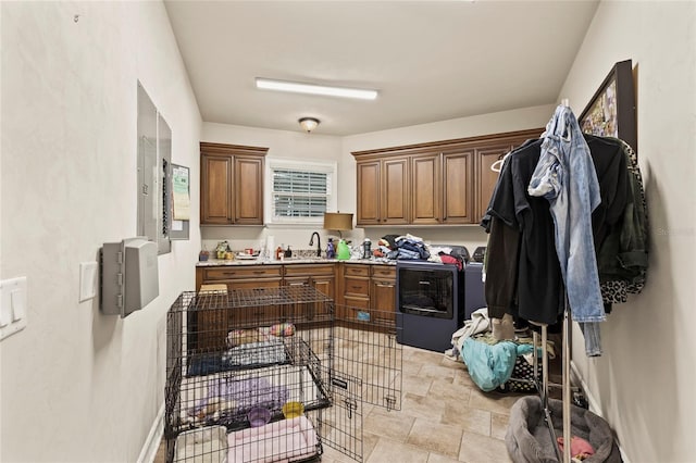 kitchen with light tile flooring and sink