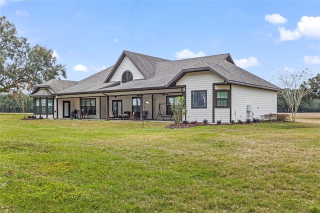 view of front of home with a front lawn