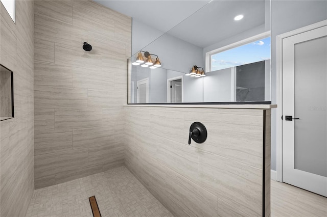 bathroom featuring tiled shower