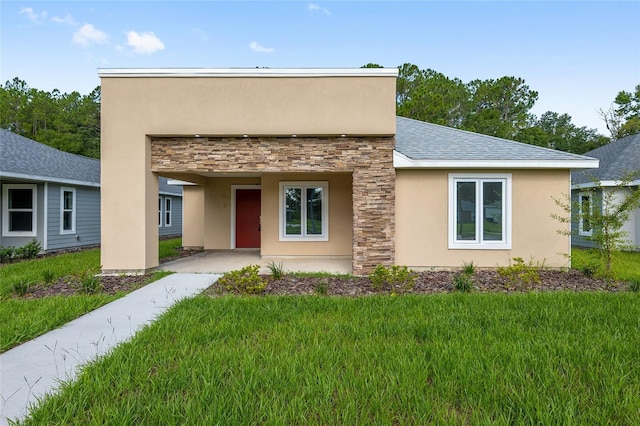 view of front of home with a front yard