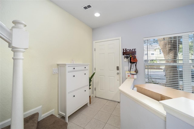 washroom with light tile patterned floors