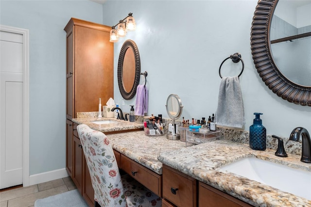 bathroom with tile floors and double vanity