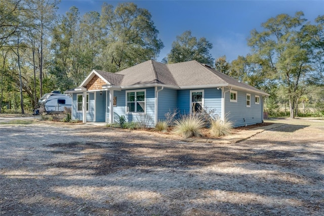 ranch-style home featuring a porch