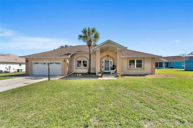 ranch-style house featuring a front yard and a garage