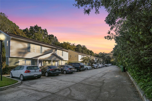 view of parking at dusk