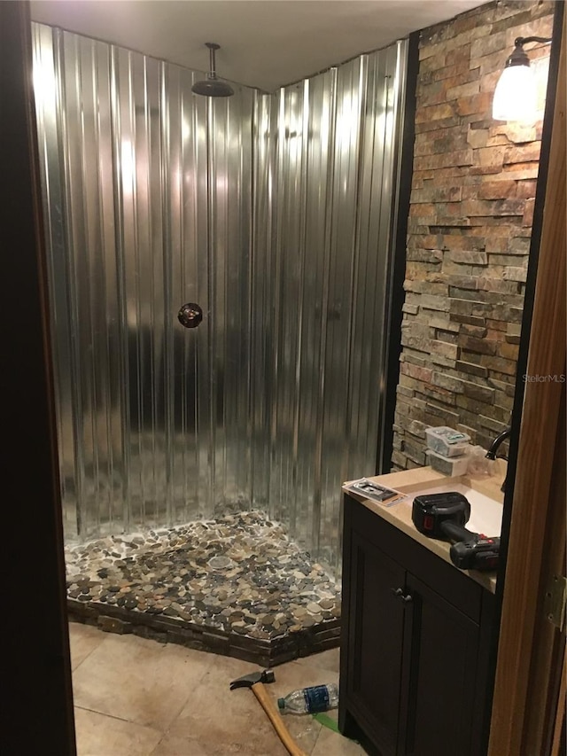 bathroom with tile flooring