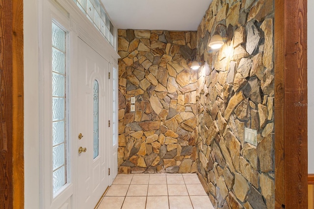 entryway featuring light tile patterned flooring