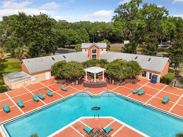 view of pool featuring a gazebo and a patio area