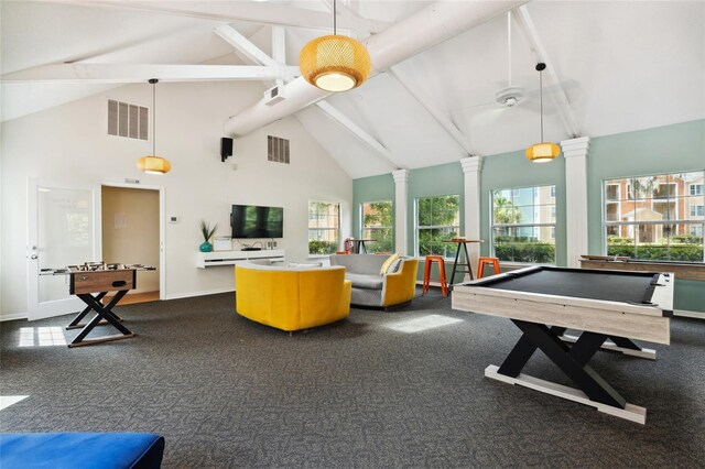 playroom with high vaulted ceiling, beam ceiling, decorative columns, and a healthy amount of sunlight