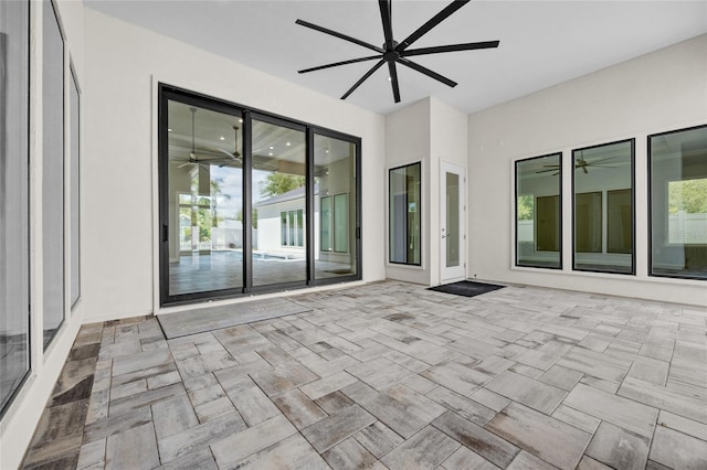 view of patio with ceiling fan