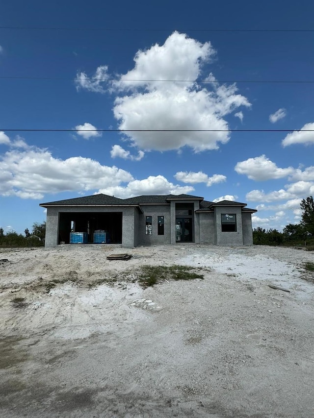 view of front of home featuring central air condition unit