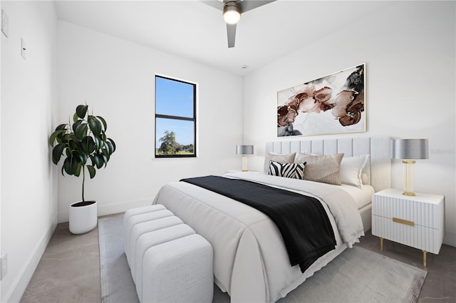 bedroom featuring ceiling fan and baseboards