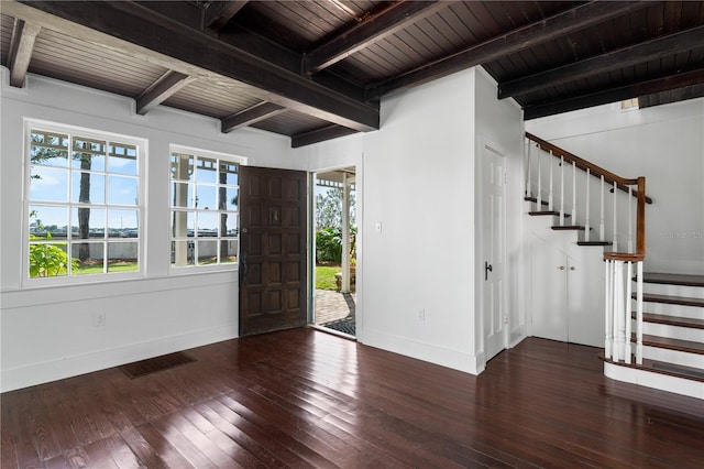 foyer featuring dark hardwood / wood-style flooring, wooden ceiling, and beamed ceiling