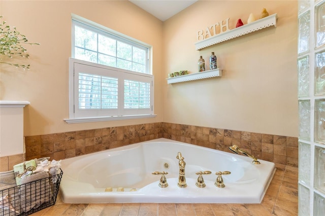 bathroom with tiled tub